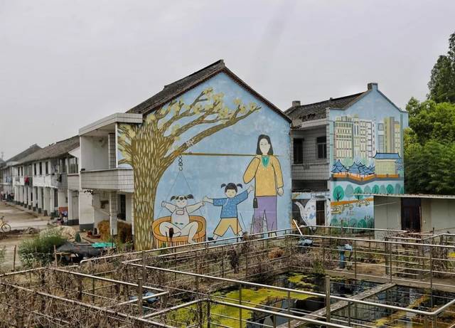 手繪墻畫,為美麗鄉村展開美麗畫卷.